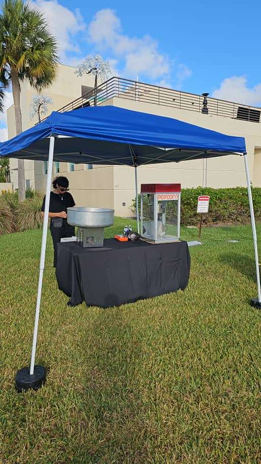 pole tent installation on grass surface